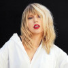 Taylor Swift Chats with Tom Cruise While Supporting Travis Kelce at Chiefs Game